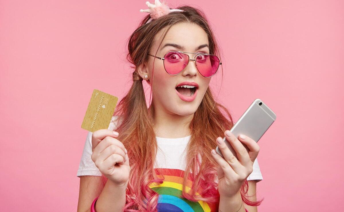 Beautiful woman with trendy pink sunglasses