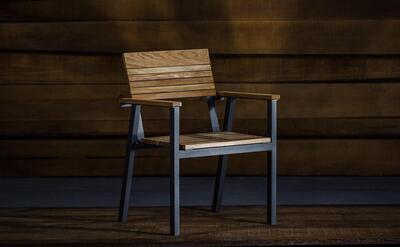 Closeup of a comfortable loft-style chair with armrests