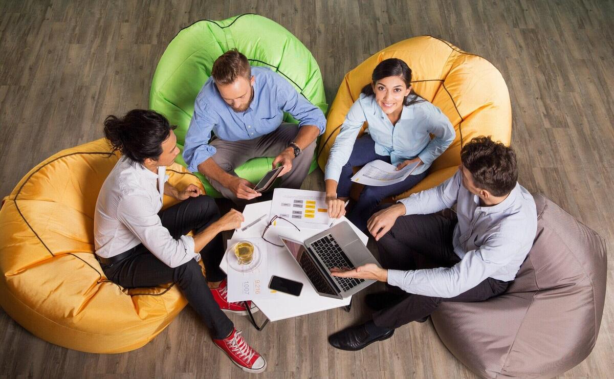 Business People Discussing Issues at Café Table