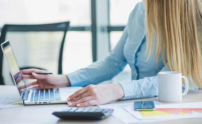 Secretary working on laptop