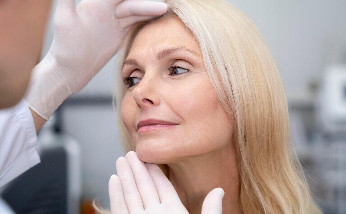 Close up doctor checking woman