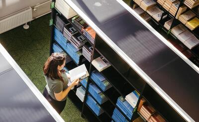 College woman in library