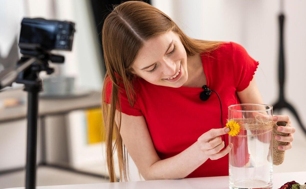 Young blogger showing decor diy tutorial at camera