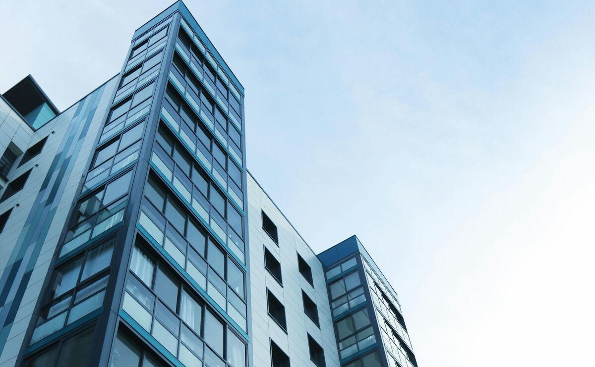 Low Angle View of Office Building Against Sky