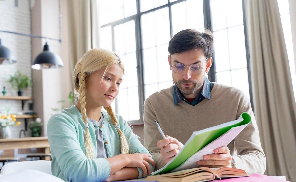 Father being a tutor for her daughter