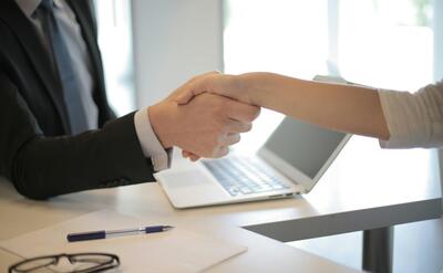 Person in Black Suit Hired An Employee