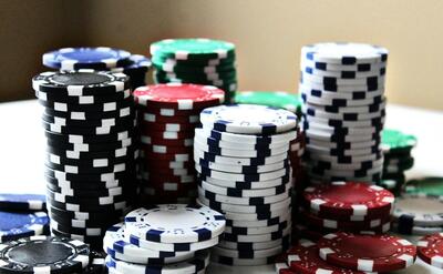 stacked poker chips with different colors