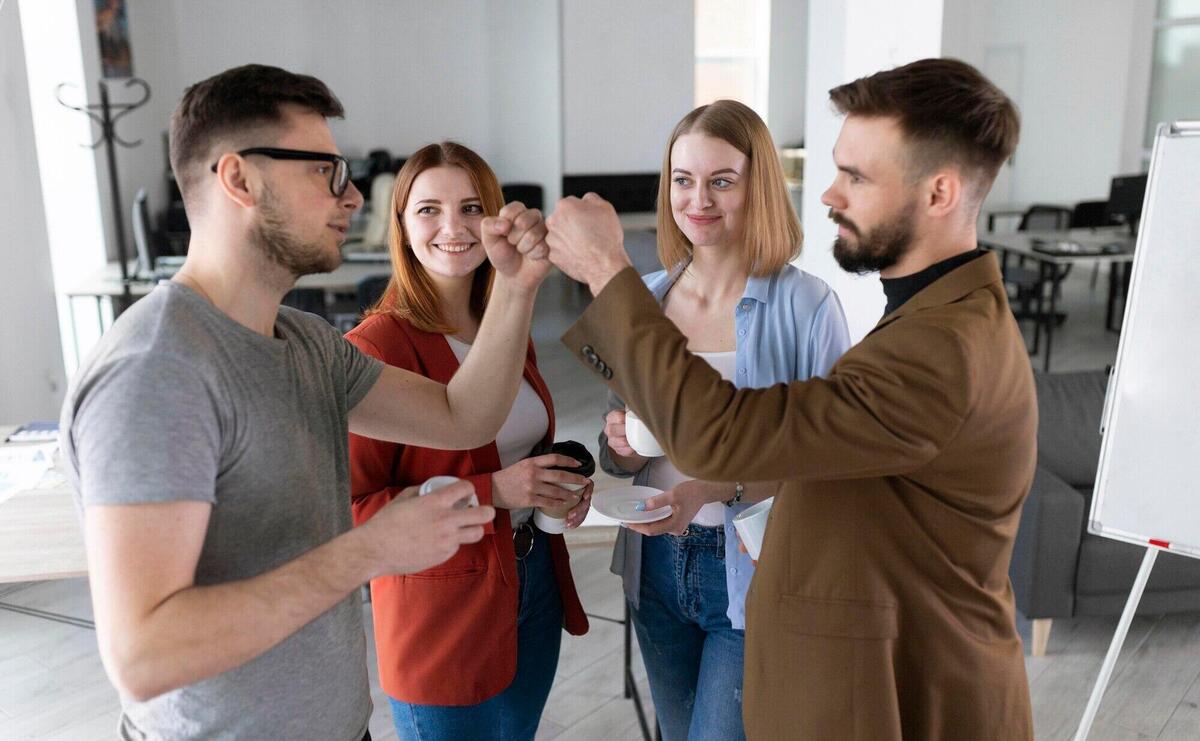 Group of coworkers at the office talking