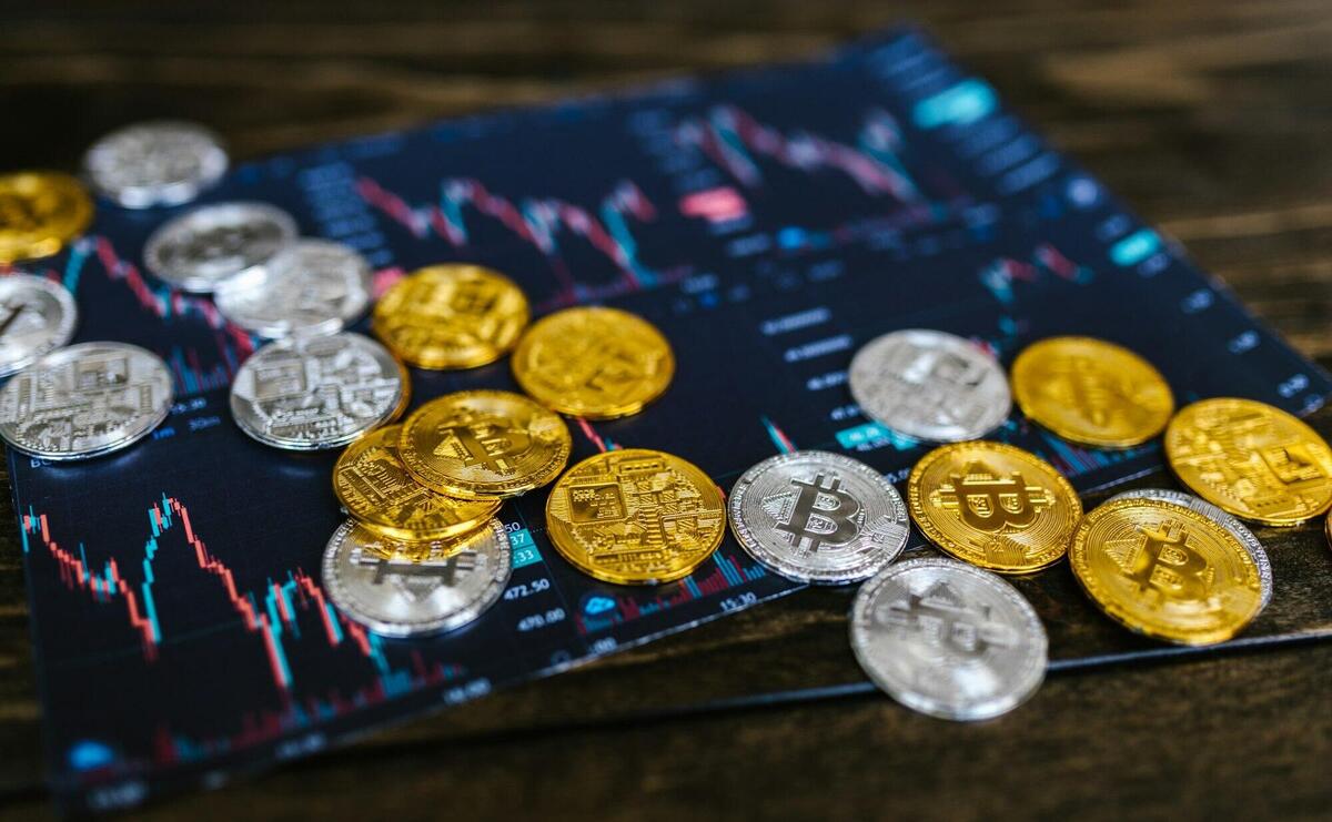 Close-Up Shot of Bitcoins on Wooden Surface