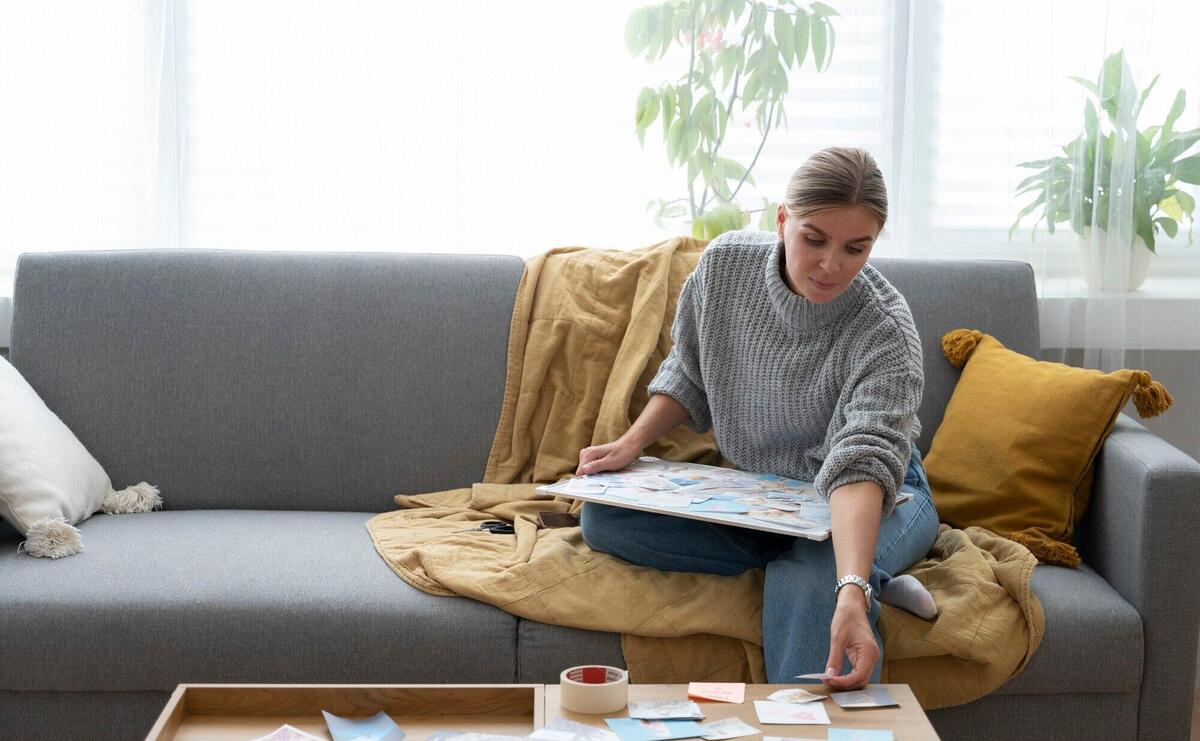 Woman making vision board front view