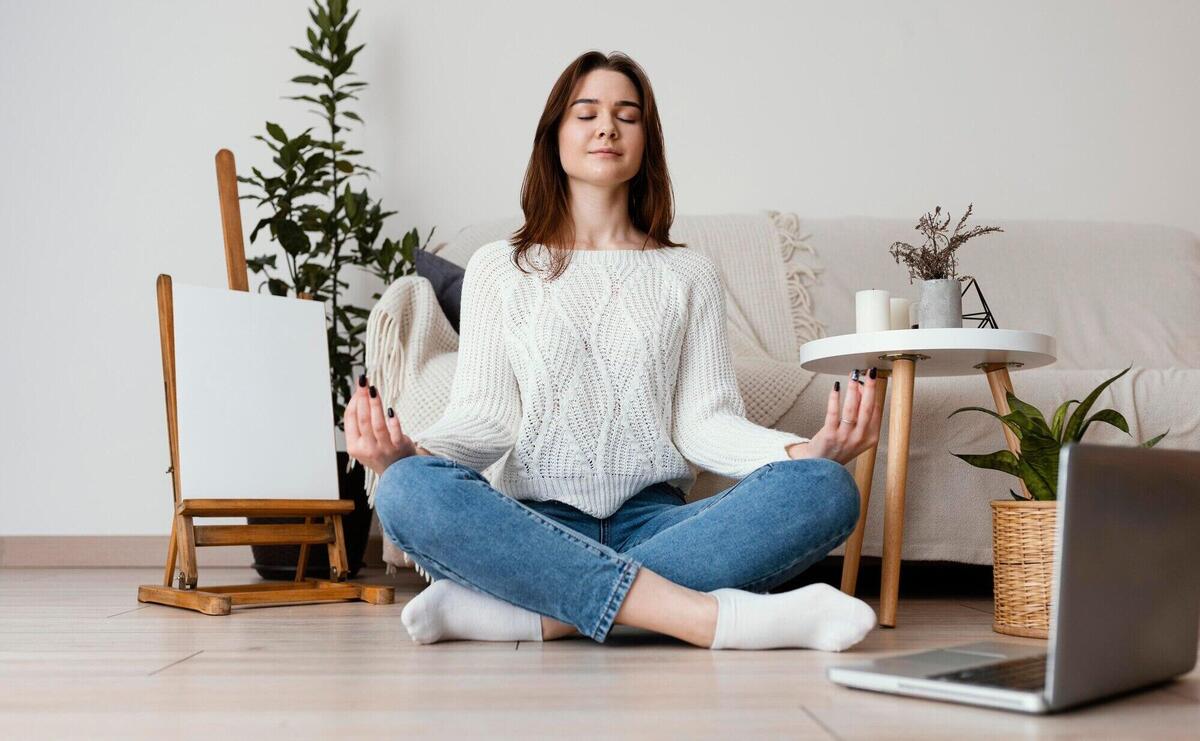 Female meditating indoor portrait