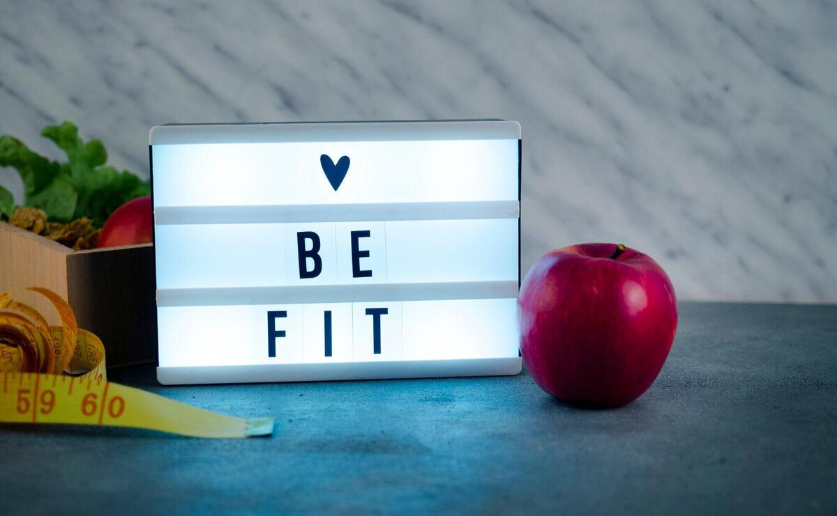 Shiny Love be fit inscription on board with apple 