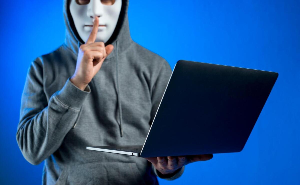 Portrait of hacker with mask