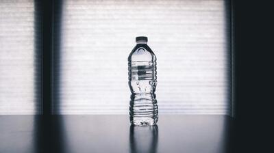 clear drinking bottle filled with water