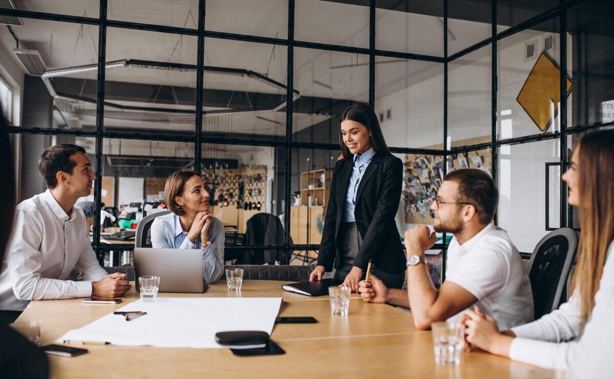 Group of people working out business plan in an office